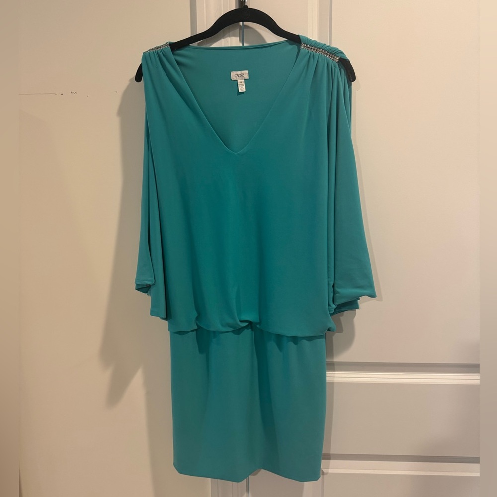 Cache Teal Dress with Rhinestone Embellished Details Open slit on sleeves.
